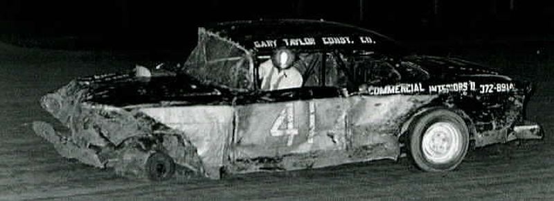 Gary Taylor on three legs coming out of turn three